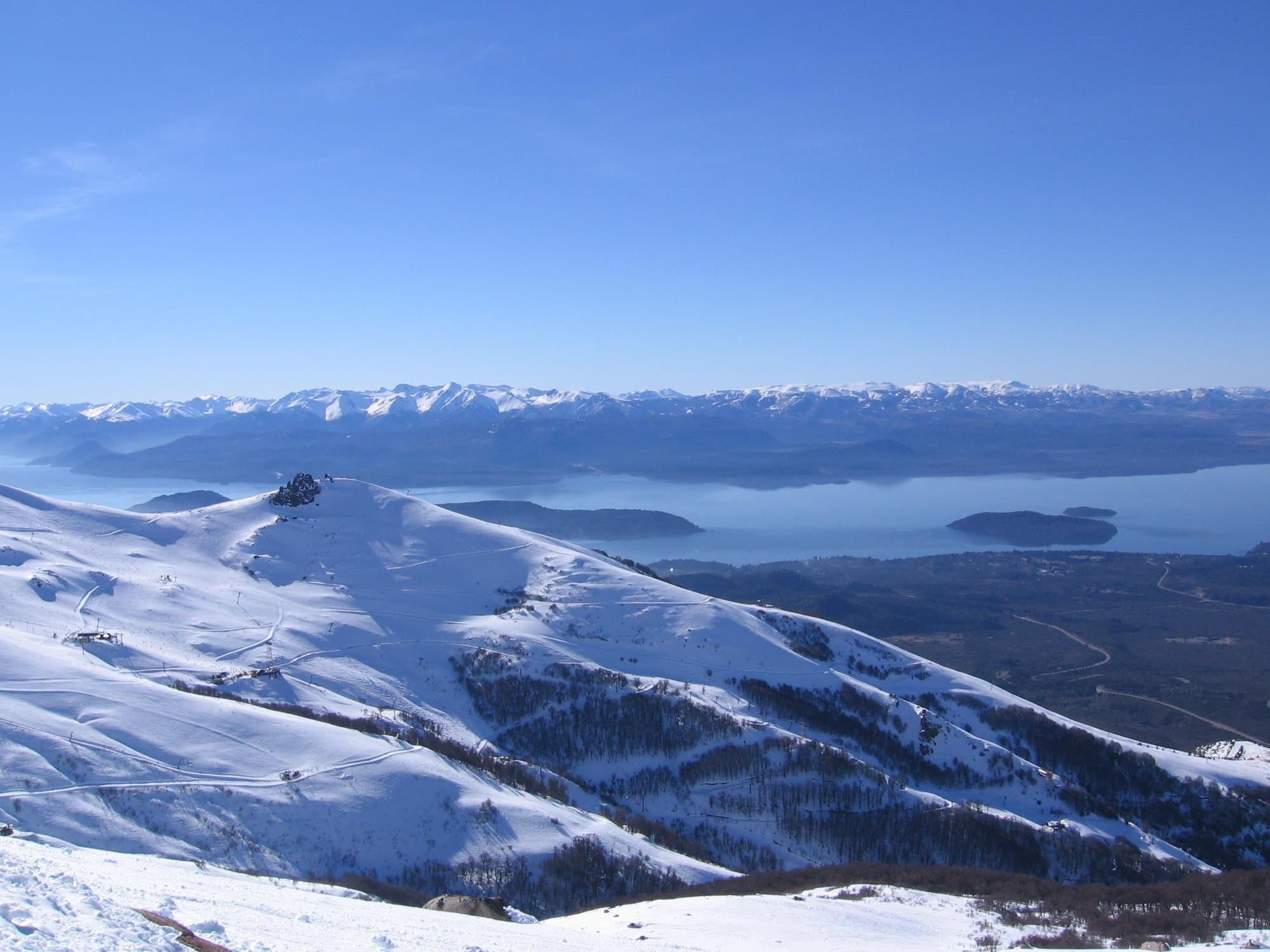 Snow-covered Cerro Catedral above Lake Nahuel Huapi